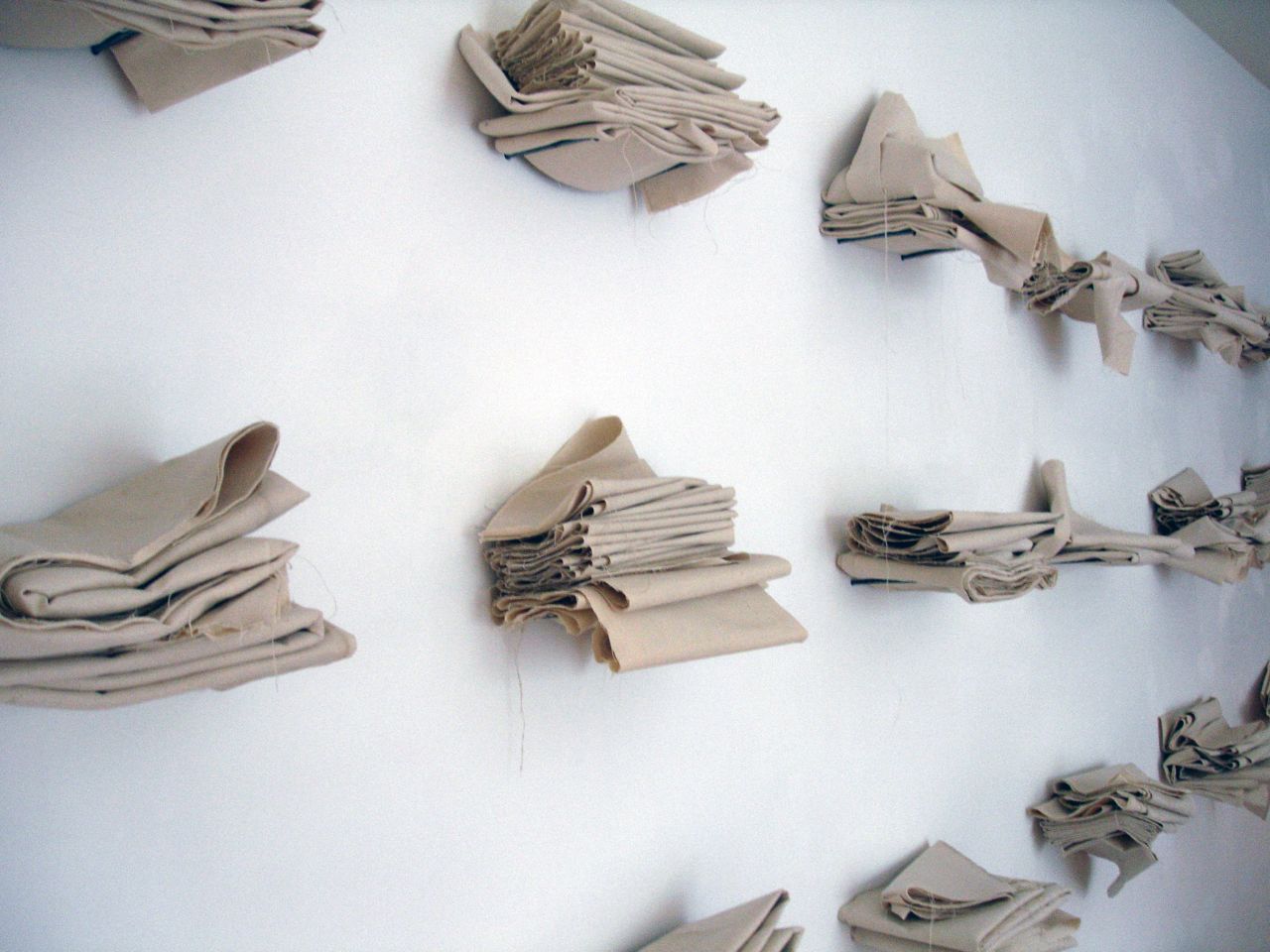 Joel Andrianomearisoa, Perfection with or without body, the burial of one's own existence, 2013. Installation viw. Textile, Variable dimensions. Courtesy Revue Noire, photo credit Revue Noire and Joël Andrianomearisoa
