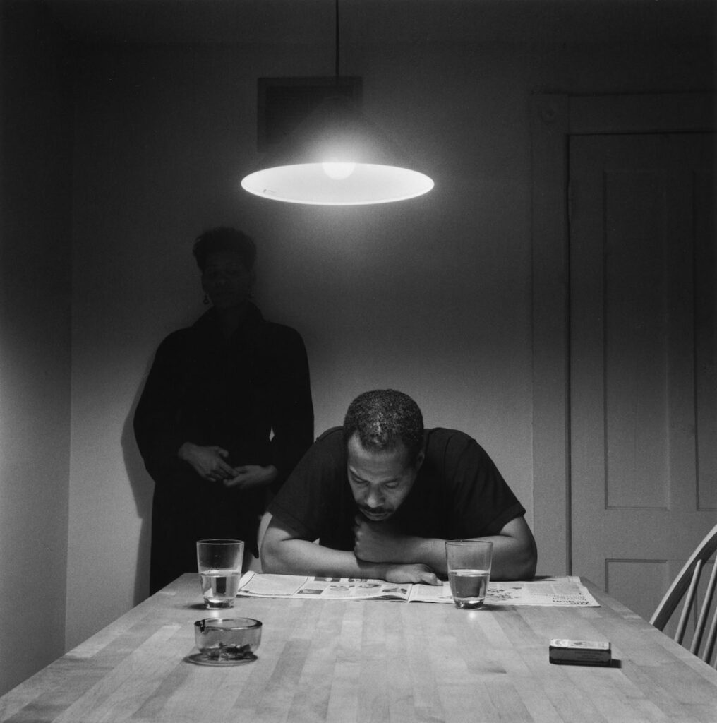 Carrie Mae Weems, Untitled (Man reading newspaper), 1990, silver print, 28 1/4 x 28 1/4 inches, 29 x 29 x 1 1/2 inches framed © Carrie Mae Weems. Courtesy of the artist and Jack Shainman Gallery, New York
