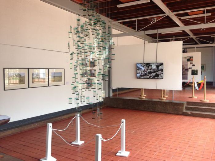 Artworks by Emma Wolukau-Wanambwa: Paradise, 2012, photography, Immy Mali: Virtually Mine, 2016, installation, Syowia Kyambi: Rose’s Relocation, 2015, digital collages, and Nástio Mosquito: 3 Continents, 2010, video. Photo: Peters-Klaphake