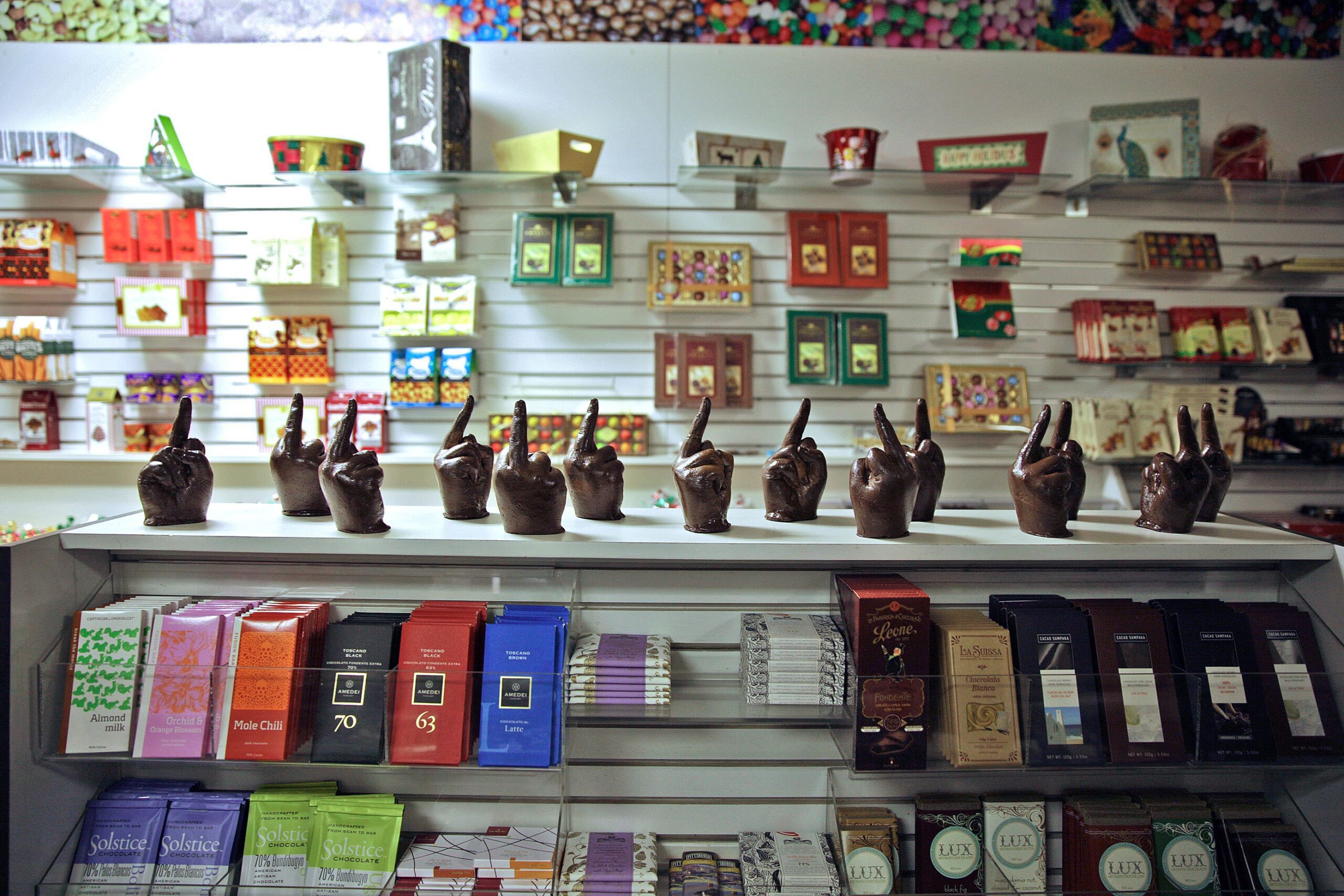 Lucia Nhamo, Fuck You Chocolates, 2014. Installation detail. Solid chocolate casts of the artist’s hand. Courtesy of the artist