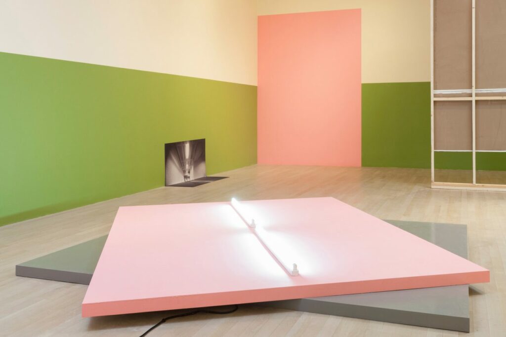 Kapwani Kiwanga
The sum and its parts, 2017
Wall paintings, archival photographs printed on fine art rag, fabric, wood, neon lights and 2-channel audio, 12:00 min.
Installation view at Logan Center, Chicago, 2017