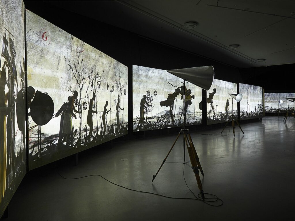 William Kentridge, More Sweetly Play the Dance, 2015. Installation view, EYE Filmmuseum, Amsterdam, 2015. Courtesy William Kentridge, Marian Goodman Gallery, Goodman Gallery and Lia Rumma Gallery. Photo: Studio Hans Wilschut.  