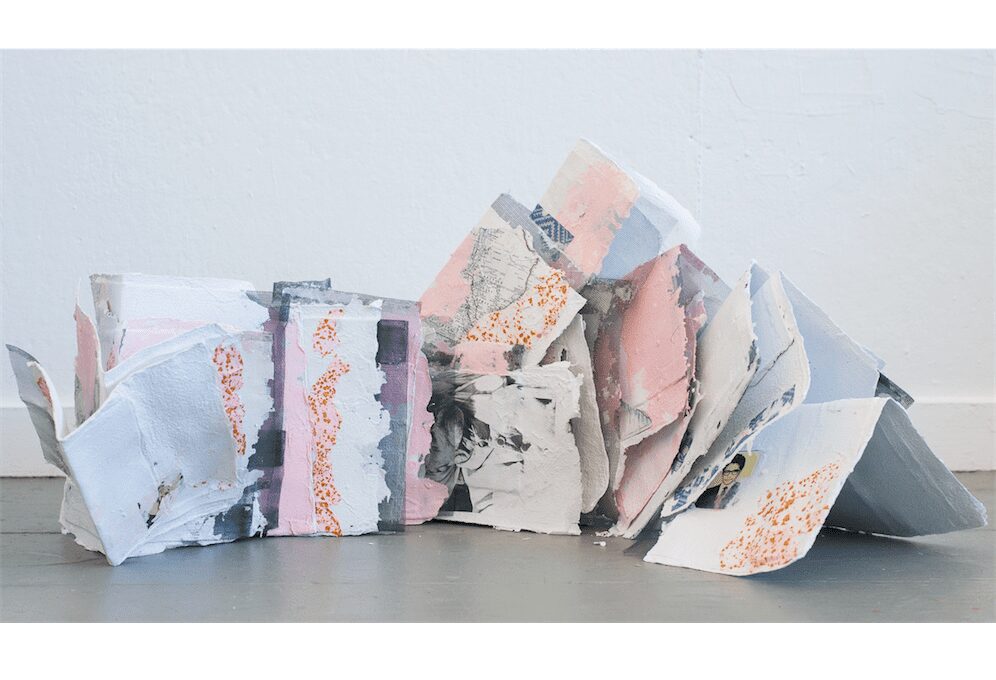 Tahir Karmali, PAPER landscape, 2016, handmade paper made from immigration applications and photocopy toner, aluminum screening, and glass, dimensions variable. Courtesy of the artist.