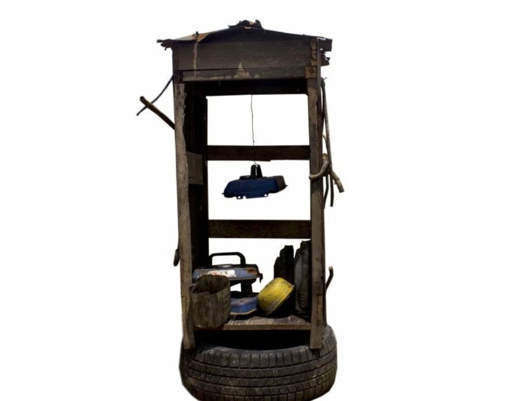 Ayo Akinwande, Shrine, 2016-2017, wood, generator tanks, kegs, engine oil, zinc sheet, tyre, 142 x 64 x 64cm