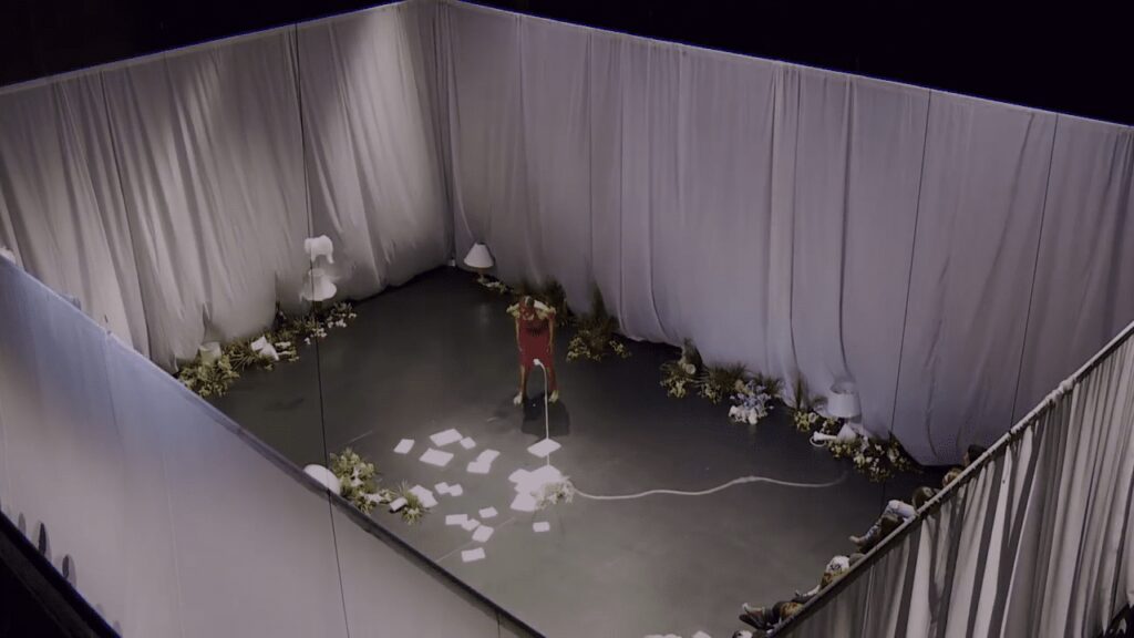 Still from Bronx Gothic, 2017, by Andrew Rossi, showing Okwui Okpokwasili performing Bronx Gothic on stage, © Andrew Rossi