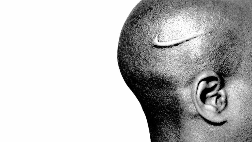 Hank Willis Thomas, Branded Head, 2003, Ed. 1 of 3 lambda photograph, digital c-print 99