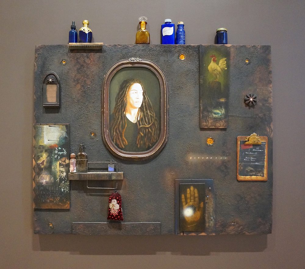 Renee Stout, The Black Wall, 2008, 34 x 42.5 x 4.5 in. Acrylic, mixed media, wood, glass and metal on plywood panel. Courtesy of Kravets Wehby Gallery