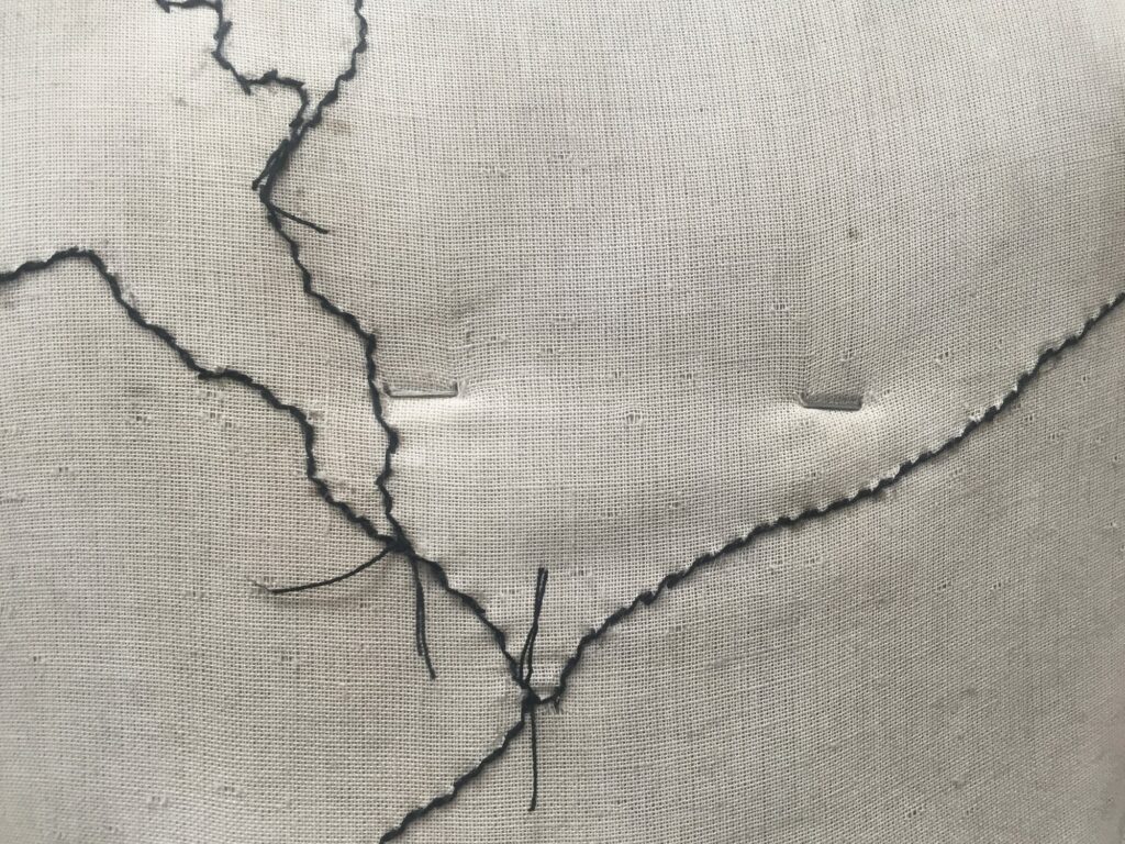 Dana Whabira, Nobody's Thing, 2018, Dress form, black cotton thread, Documentation of work in progress.