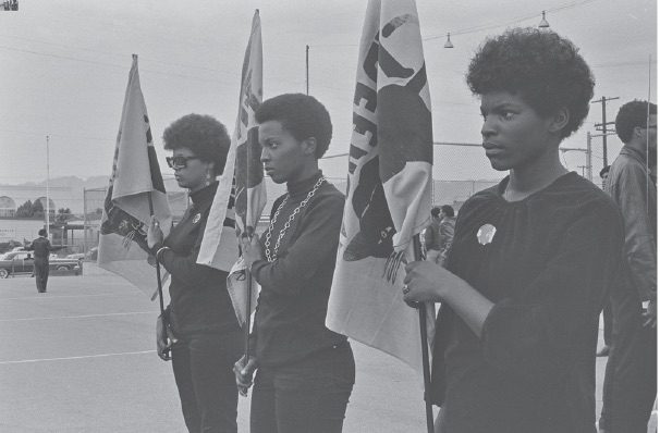 Pirkle Jones. Black Panthers drilling before Free Huey Rally, DeFremery Park, Oakland, CA, #23 from A Photographic Essay on The Black Panthers. © Regents of the University of California. Courtesy Special Collections, University Library, University of California Santa Cruz.