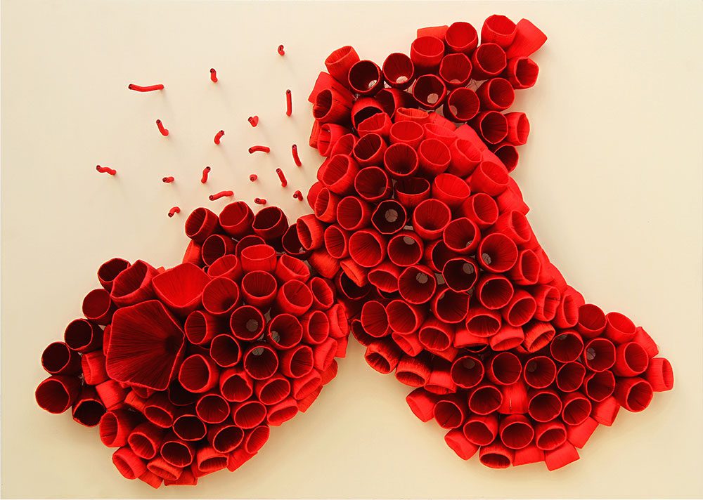 Ghizlane Sahli, Histoires de Tripes, Wall Sculpture, 2018. Silk on plastic/metal on wood panel, 90 x 126 x 30 cm. Courtesy the artist.