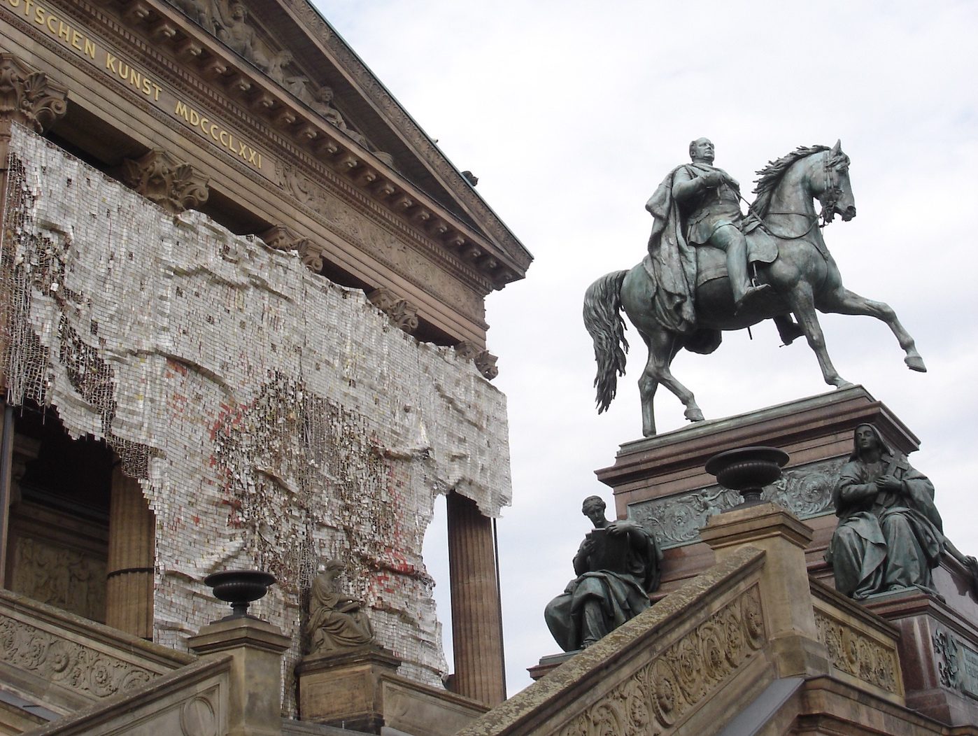 El Anatsui's project for the exhibition Who Knows Tomorrow, a monumental metal cloth installed on the façade of Berlin's Alte Nationalgalerie, 2010.