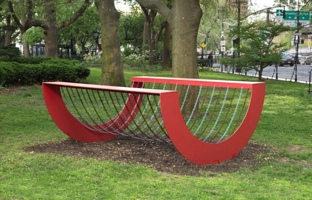 Melvin Edwards, Homage to Coco, 1970. Painted steel and chain. 48 x 96 x 120 in. Installation view, Public Art Fund, City Hall Park, New York, 2021. Courtesy Alexander Gray Associates, New York; Stephen Friedman Gallery, London. © 2022 Melvin Edwards / Artists Rights Society (ARS), New York.