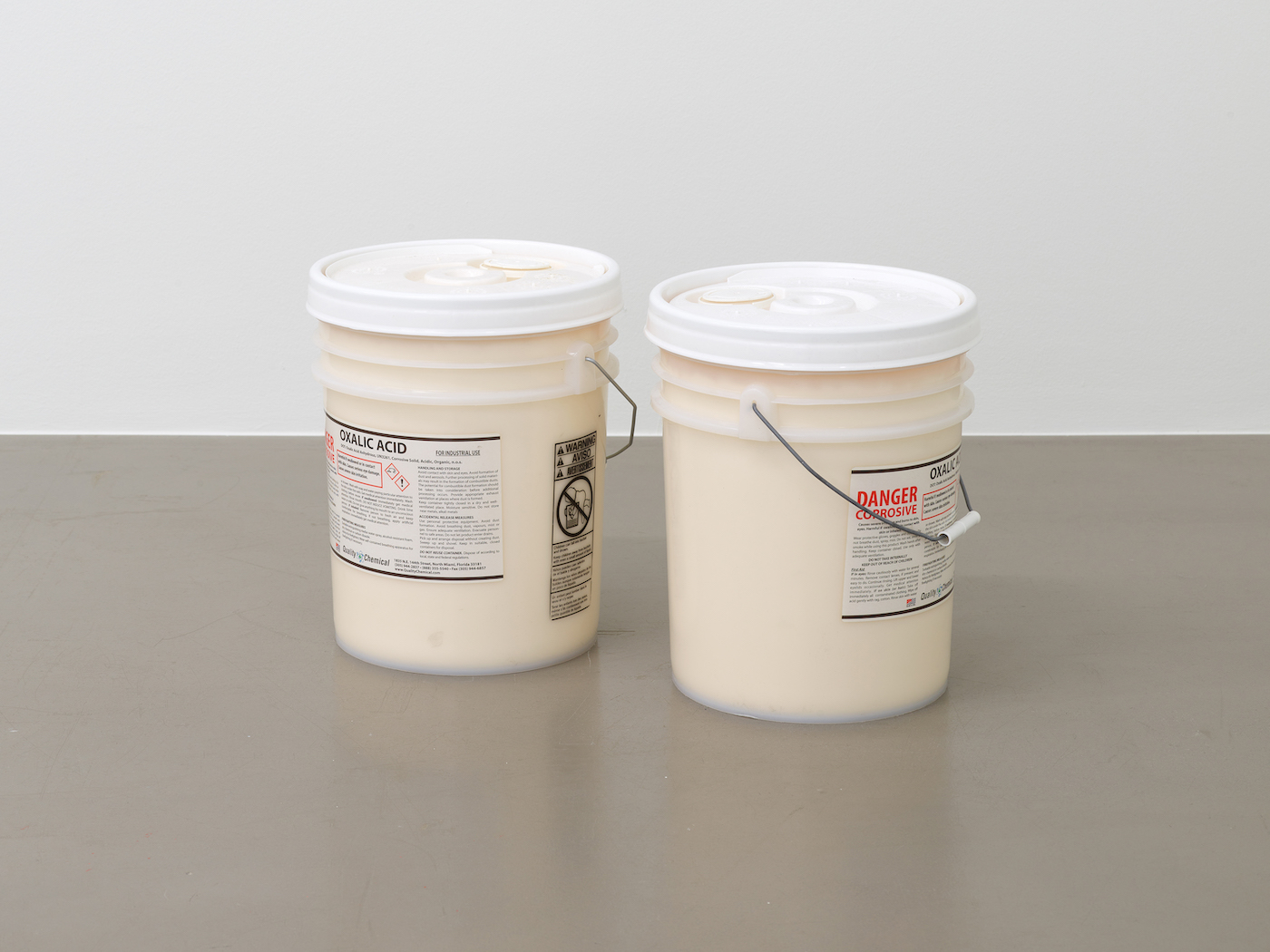 Cameron Rowland, macandal, 2023
Oxalic acid
37.5 x 30.5 x 67 cm

Packets of materials that could invoke spirits, protect against punishment, and poison slave masters were called macandals. They were at the center of a plot in 1757 to poison all the white people in Haiti. The plot was organized by hundreds of enslaved and free black people. All macandals were subsequently outlawed. Their trade and use continued despite their criminalization.

Enslaved people throughout the Atlantic world used arsenic, manioc juice, ground glass, and oxalic acid to poison overseers, masters, masters’ children, and livestock. Oxalic acid is a stain remover and household cleaner. 
