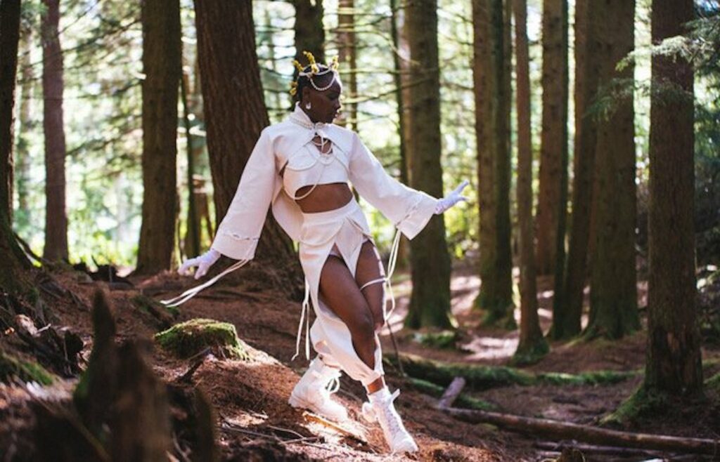 OMOS, 2022, Production photo featuring Divine Tasinda, Photo: Washington Gwande.