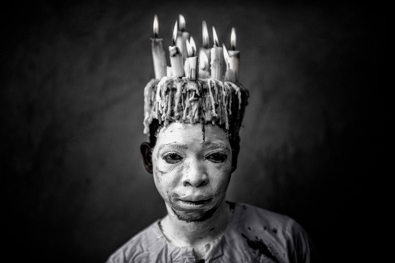 Mário Macilau, A candle man, from Faith series, 2018. Courtesy of Ed Cross.