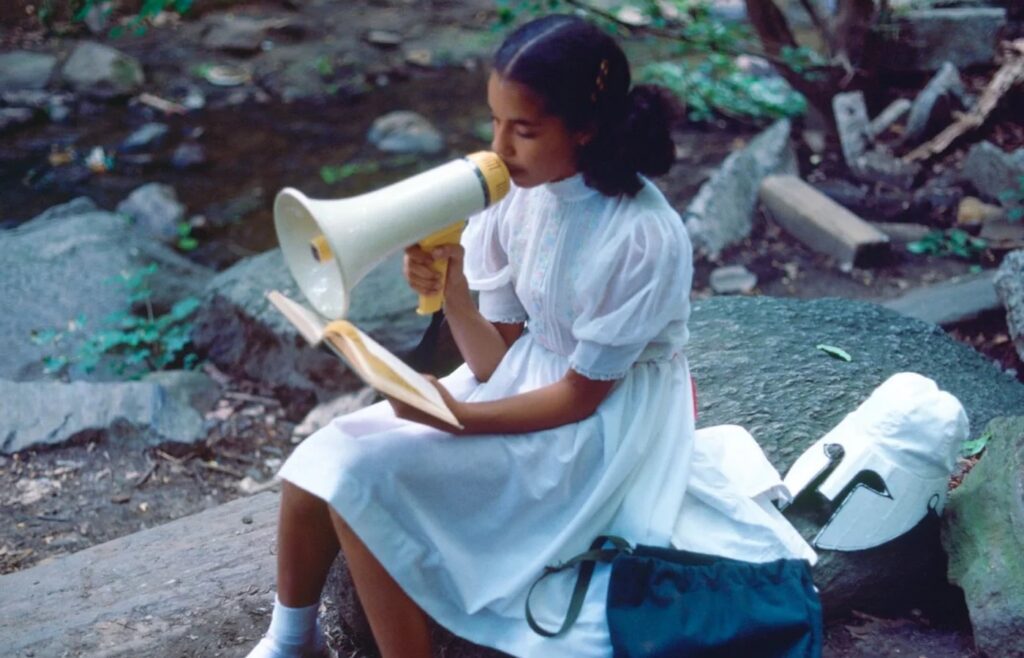 Lorraine O'Grady, Rivers, First Draft: A Little Girl with Pink Sash memorizes her Latin lesson, 1982/2015. Courtesy of the Lorraine O’Grady Trust and Mariane Ibrahim (Chicago, Paris, Mexico City) © 2025 Lorraine O’Grady/Artist Rights Society (ARS), New York.